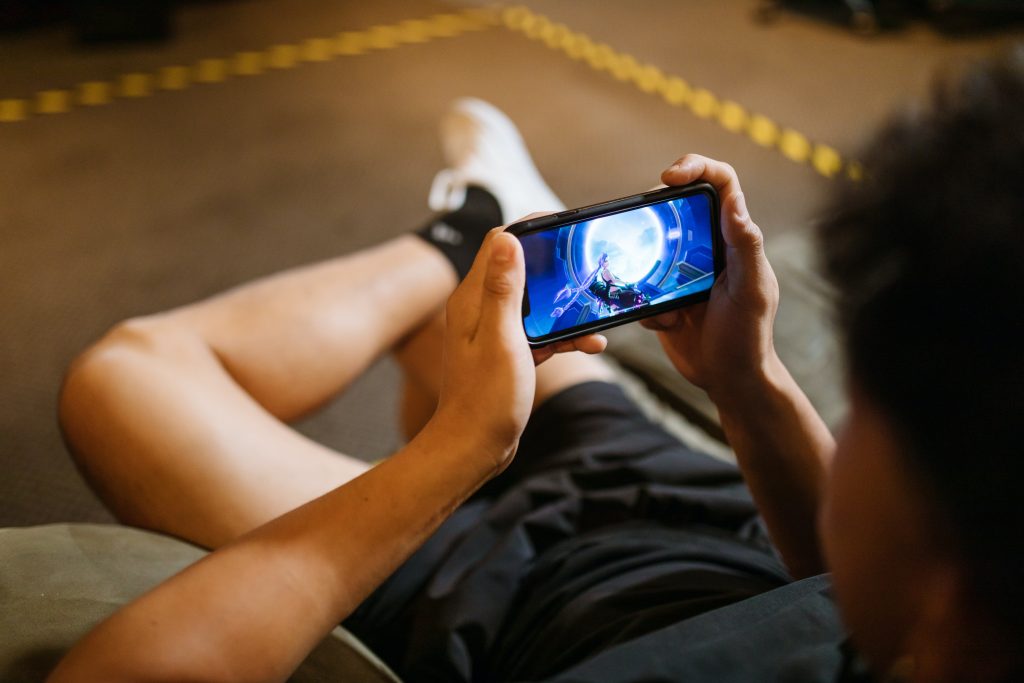 Boy playing on mobile